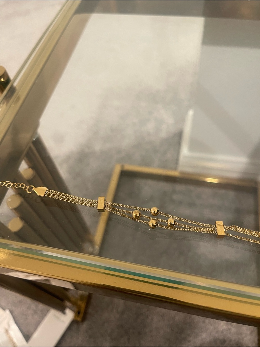 Delicate Gold Multi-Chain Bracelet with Bead and Bar Accents